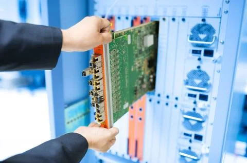 Fix network switch in data center room Stock Photos