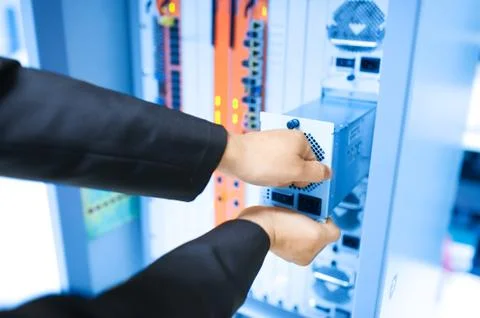 Fix network switch in data center room Stock Photos