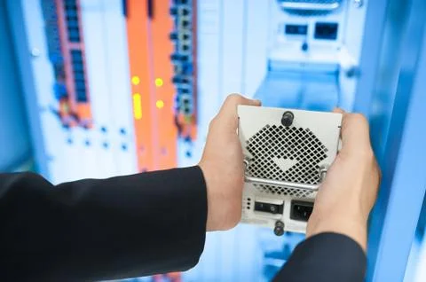 Fix network switch in data center room Stock Photos