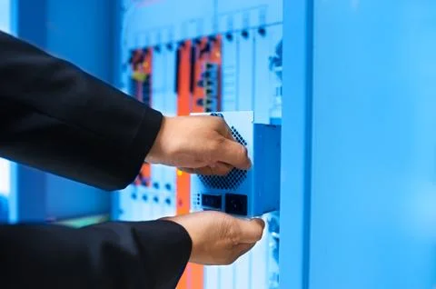 Fix network switch in data center room Stock Photos