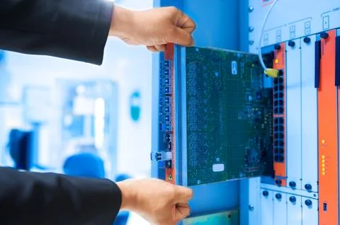 Fix network switch in data center room Stock Photos