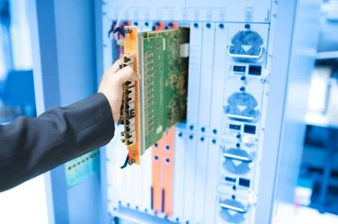 Fix network switch in data center room Stock Photos