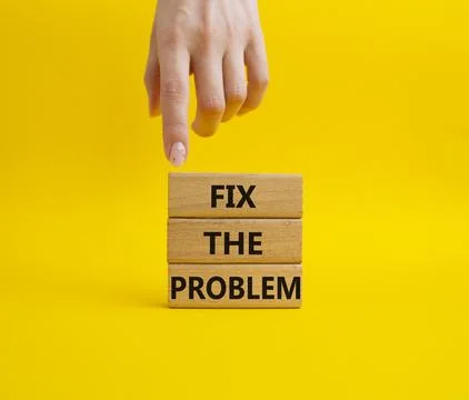 Fix the problem symbol. Wooden blocks with words Fix the problem. Beautiful.. Stock Photos
