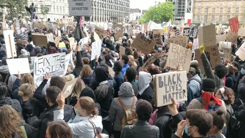 FIX THE SYSTEM sign at Black Lives Matter Protest Rally March London 4K Stock Footage 132059503