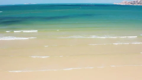 Fixed Angle Aerial Shot of Coastline Waves Stock Footage 319928703