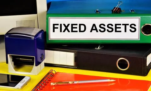 Fixed assets. Text label on the folder. Stock Photos
