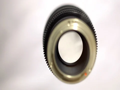 Fixed black lens on the white background Stock Footage 72924282