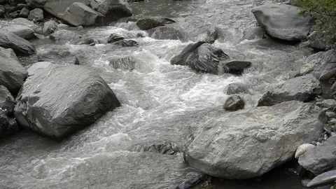 Fixed Camera on a grey flowing river with sound Stock Footage 93785602