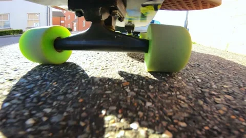 Fixed Camera Onboard Skateboard Deck Being Ridden Fast on British Sidewalk Stock Footage 239096614