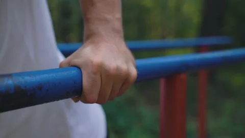 Fixed Close-up of hand is holding on to the horizontal bar. Stock Footage 157071163