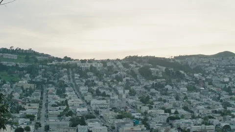 Fixed establishing clip of a city with parallel lined roads on hillside, Stock Footage 241379527