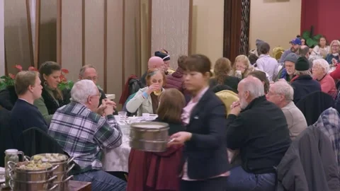 Fixed filming of foreign friends tasting Chinese specialty dumplings in rest. Stock Footage 256132766