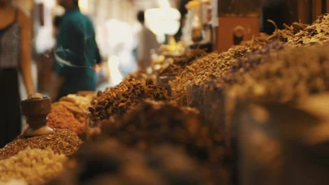 Fixed filming of various spices and Indian workers moving goods in India. Stock Footage 249047527