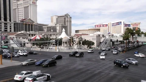 Fixed high angle shot of traffic passing a crossway in daytime Las Vegas Stock Footage 106621089
