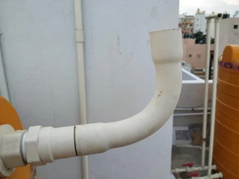 Fixed Plastic Pipe to Solar Geyser Panel or Drum and Cityscape view from top  Stock Photos