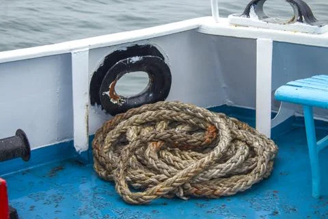 A fixed  rope of a sailing ship in the harbor Stock Photos