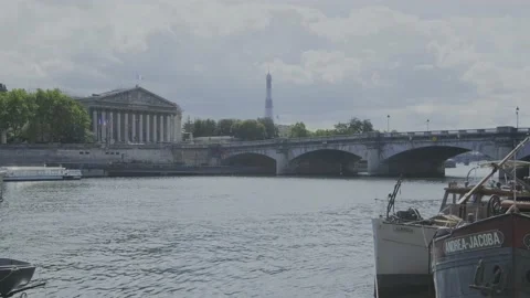 Fixed shot on a bridge crossing the Seine in Paris, France. Stock Footage 194789567