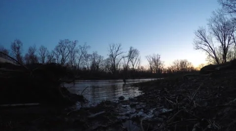 Fixed shot of calm river at dusk Stock Footage 49165444