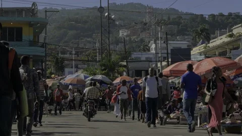 Fixed shot in a crowded street in Port au Prince, Haiti. Stock Footage 201097744