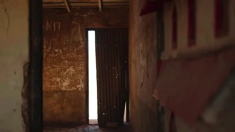 Fixed shot of entrance door frame from inside Stock Footage 337874715