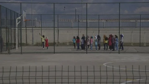 Fixed shot on a group of Syrian children in a refugee camp in Kilis, Turkey. Stock Footage 201925762