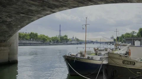 Fixed shot under a bridge of the Seine in Paris, France. Stock Footage 194787577