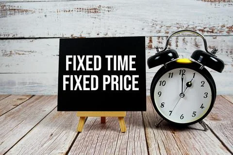 Fixed Time Fixed Price text with easel and alarm clock on wooden background Stock Photos