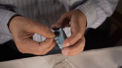 Fixing artificial teeth to the occlusion of the upper jaw mold for RPD, Stock Footage 109586279