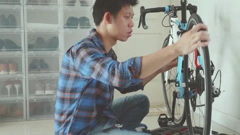 Fixing a Bicycle: A DIY Guide for Enthusiasts Stock Footage 314637713