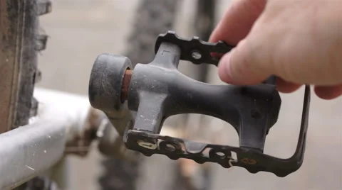 Fixing a Bicycle Pedal Spinning Stock Footage 46225960