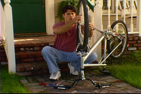 Fixing the Bike Video stock 2597205