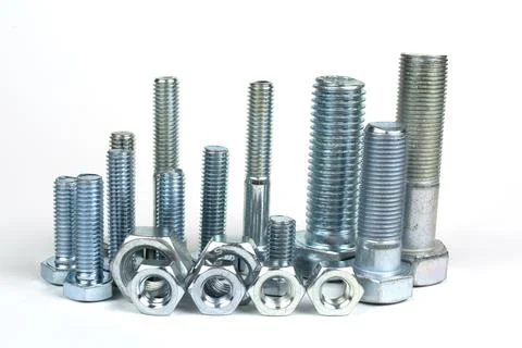 Fixing bolts of different sizes with nuts Stock Photos
