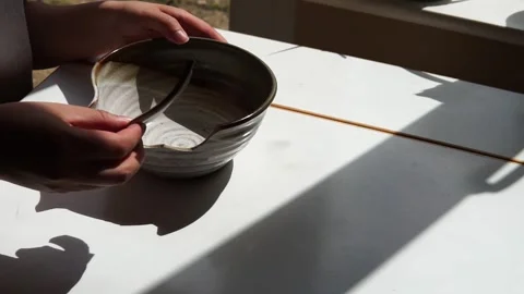 Fixing a broken bowl Stock Footage 264342751