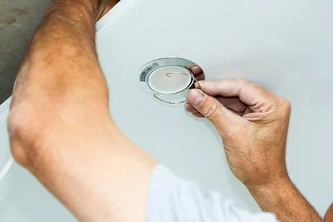 Fixing the bulb with a retaining ring. Stock Photos