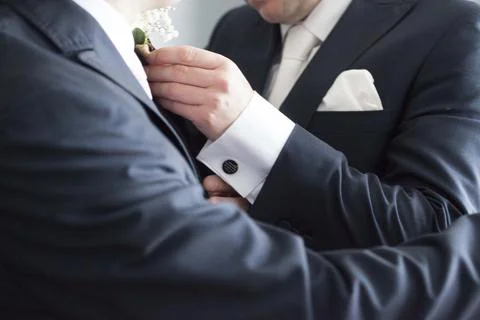 Fixing the button hole Stock Photos