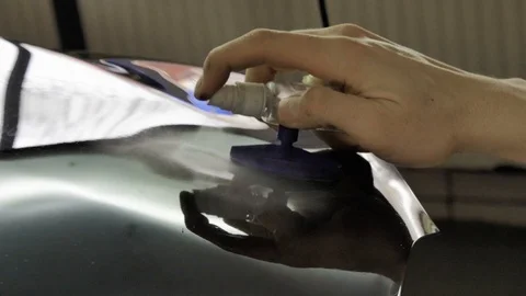 Fixing car body. PDR technology. Car body repair Stock Footage 92085762