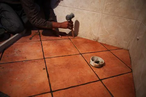 Fixing Ceramics Tile Stock-Fotos