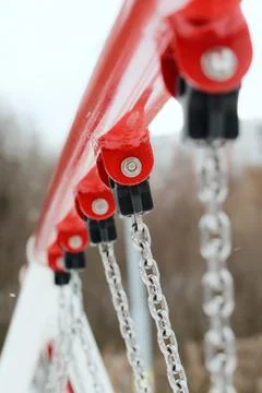 Fixing chain to crossbar swing Stock Photos