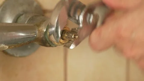 Fixing a Dripping Leaky Faucet A Comprehensive StepbyStep Guide for Homeowners Stock Footage 288993217