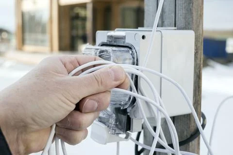 Fixing electricity in winter 写真素材