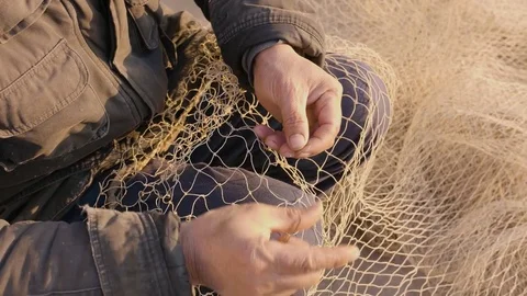 Fixing fishing net Stock Footage 83878945