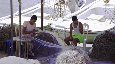 Fixing the fishnet medium shot Stock Footage 52967328