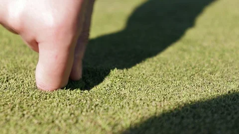 Fixing Golf Ball Mark on Green Extreme Close Up Stock Footage 91451282