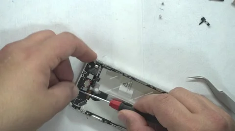 Fixing iPhone in a lab Stock Footage 61131131