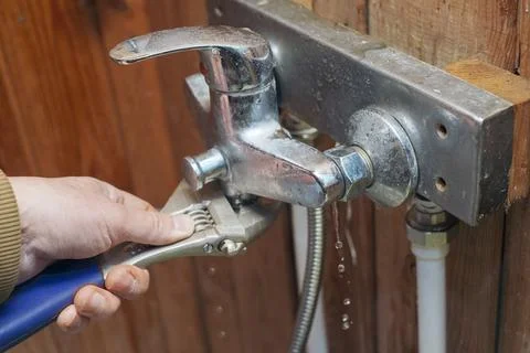 Fixing leaking tap Photos