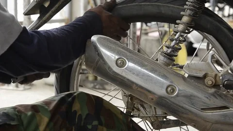 Fixing Motorcycle. Stock-Footage 77749084