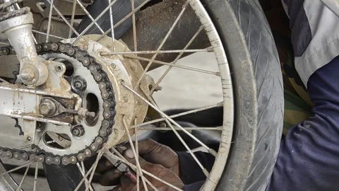 Fixing Motorcycle. Stock Footage 77749223