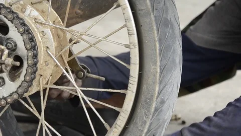 Fixing Motorcycle. Stock Footage 77749270