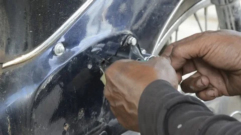 Fixing Motorcycle. 스톡 동영상 77858323