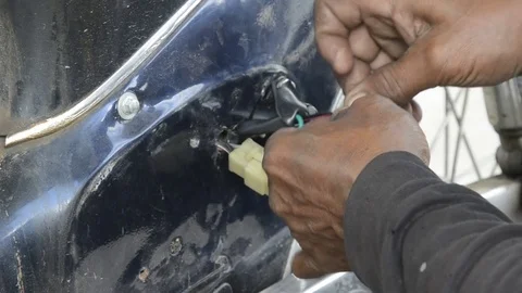 Fixing Motorcycle. Stock Footage 77858329